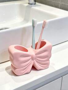 1 cái giá đựng bàn chải đánh răng phòng tắm dễ thương, phù hợp trang trí và phụ kiện phòng tắm, lưu trữ bàn trang điểm, trang trí phòng, trang trí nhà, cũng là món quà tuyệt vời cho bạn nữ - Giá đỡ bàn chải đánh răng hình nơ - Xem 3