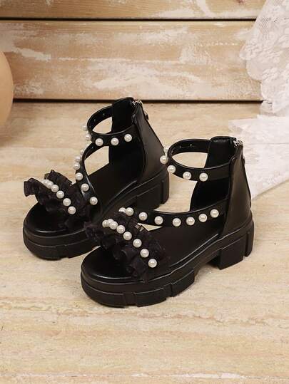 1 đôi sandal thời trang màu đen cho bé gái, chất liệu PU mờ + viền lưới hoa ngọc trai, hở mũi, đế dày, thiết kế khóa kéo phía sau chống trượt, sandal công chúa ngọt ngào kiểu La Mã, thích hợp cho đi chơi, đi học, dự tiệc, nghỉ lễ, mùa xuân/hè 2026.