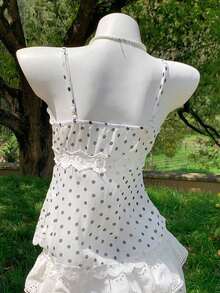 Este camisol de encaje bordado con flores de mujer de 2026 es una pieza elegante para primavera/verano, adecuada para varias ocasiones como vacaciones en la playa, salidas casuales y estilos Y2K/2000.Es perfecto para vacaciones de primavera, - Blanco y Negro - Ver 2