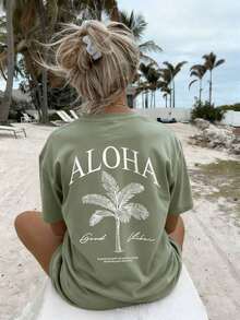 Camiseta de manga corta con cuello redondo y estampado de palmeras para mujer, estilo casual, nueva colección primavera/verano, estilo resort a la moda, camiseta gráfica, para vacaciones. - Verde hierba - Ver 1