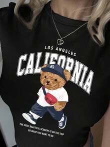 Women's Fitted Crop Top With A Round Neck, Short Sleeves, And A Youthful California-Style Bear Print. A Super , Minimalist Design. Ideal For Back To School And Everyday Wear In Summer. Made From A Cool And Very Comfortable Fabric. Looks Great For Going Out, Meetings, And Casual Looks. Easy To Pair With Jeans And Shorts. A Favorite Among Young Women. 8337 - 黑色 - 查看 5