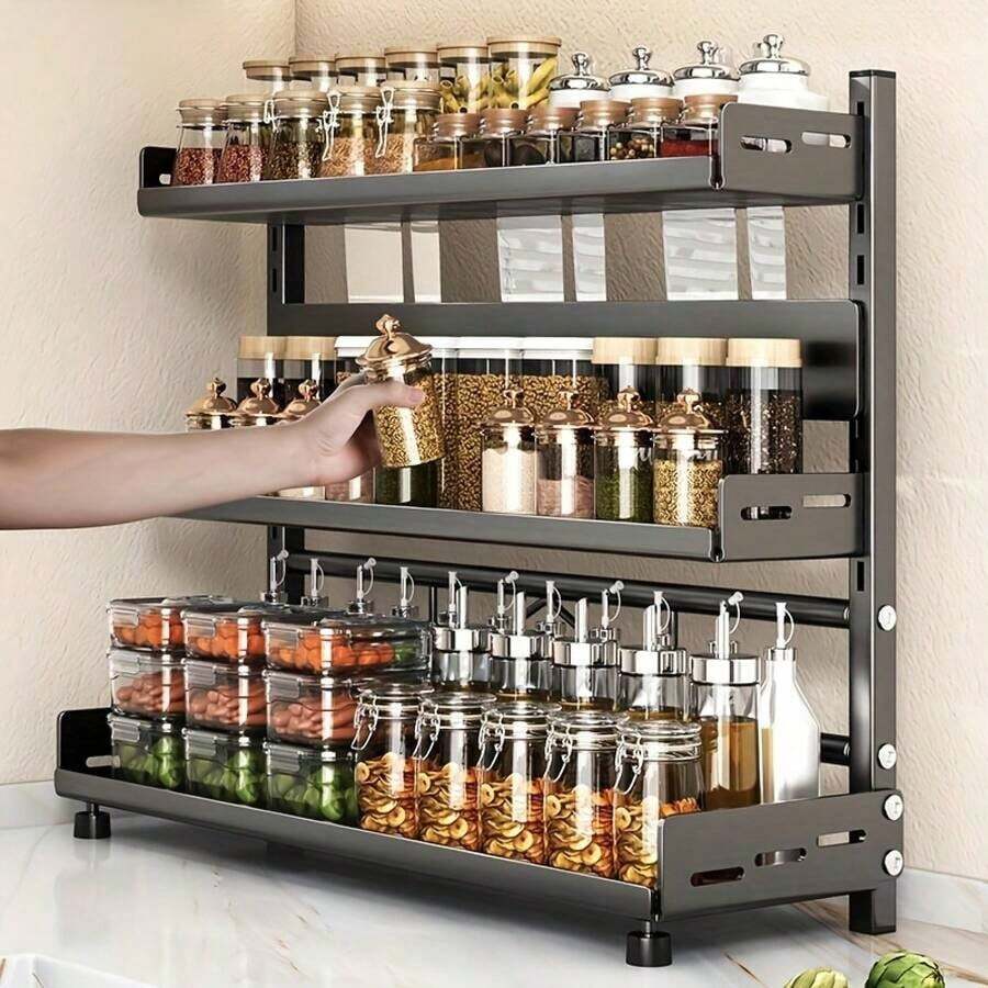 Questo pratico scaffale da cucina a tre ripiani presenta un'altezza regolabile, una grande capacità ed è un'unità di stoccaggio multifunzionale e salvaspazio, adatta per appartamenti, cucine e sale da pranzo. - nero - Visualizzare 1