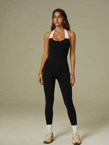 UONNOU Women's Color Block Halter Backless Jumpsuit, Ultra Soft High Elastic Peach Butt Lifting Seamless Fitted One Piece Gym Bodysuit - Black - View 5