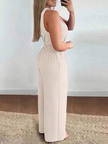 Elegante mono de pierna ancha con escote en V cruzado, hebilla de metal en la cintura, para mujeres en vacaciones - Albaricoque - Ver 2