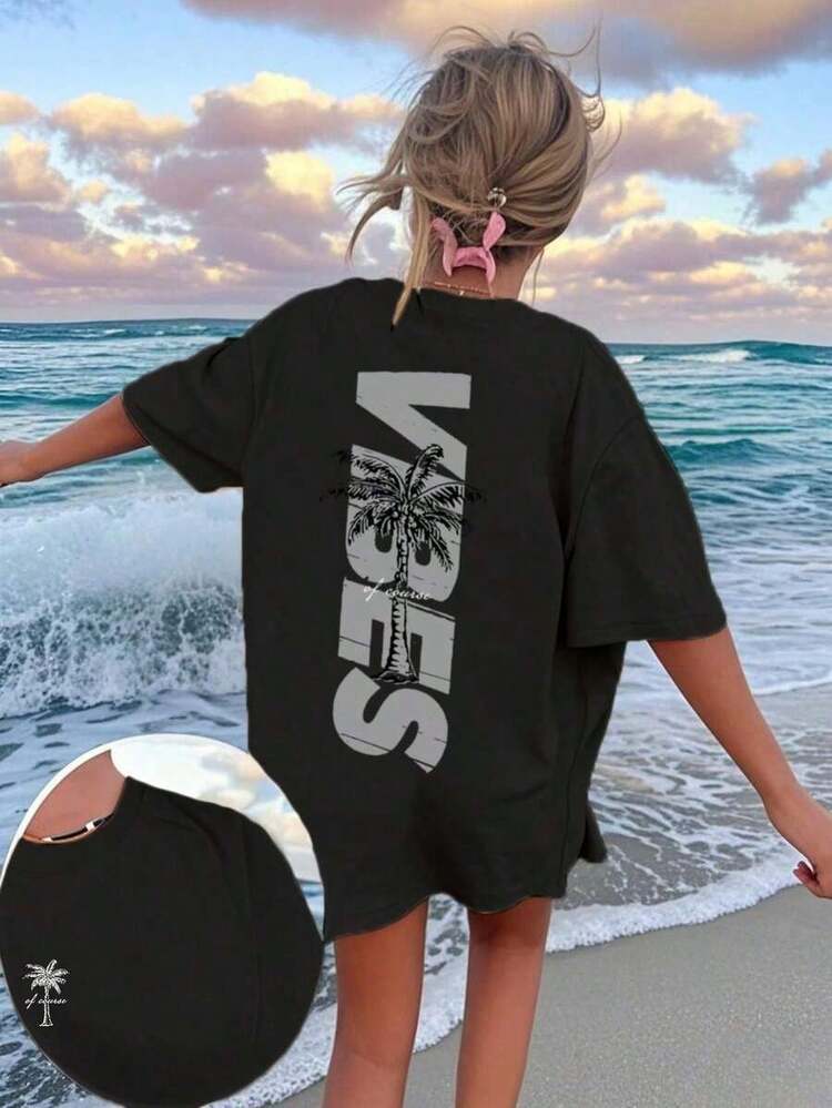 Minimalist Short-Sleeved T-Shirt With A Coconut Print. Available In Three Colors, Comfortable For Summer, Everyday Wear, And Travel. - Black - View 1