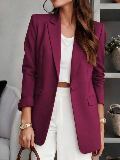 Áo blazer nữ màu trơn cổ bẻ, thiết kế túi trước cài cúc, tay dài, phù hợp mặc công sở và thường ngày, thích hợp cho mùa thu, đông và xuân.