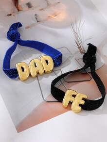 这款时尚优雅的创意金铜色“Fe”和“Dad”字母亮片装饰扣手链，适合日常佩戴、庆祝活动、送礼、派对和街头穿搭。这款设计师款父亲节配饰是送给父亲和朋友的完美礼物，也是理想的父亲节礼物之选。 - 黑色 - 查看 5