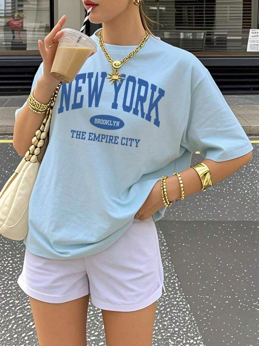 Envío gratis, entrega local enéxico, entrega en 4 días.Camiseta holgada de verano para mujer con estampado de letras, casual y versátil para uso diario.Camiseta gráfica, vacaciones - Celeste 2 - Ver 1