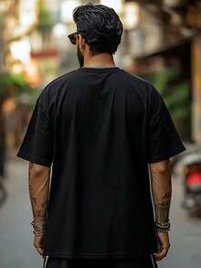 Camiseta de ajuste relajado para hombres hecha de 100%, peso de 180g, disponible en tallas grandes (XL-5XL), con estampados, diseño de cuello redondo, mangas cortas, perfecta para cualquier temporada y muy versátil - Multicolor - Ver 2