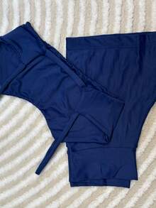 Two-Piece Set, Fitness Shorts And Top With Open Back And Opening For Padding. - Egyptian Blue - View 3