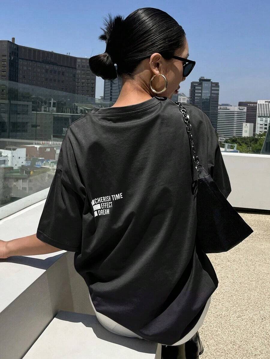 Camiseta de gran tamaño con estampado de letras y mensaje CHERISH EFFECT DREAM. - Negro - Ver 1