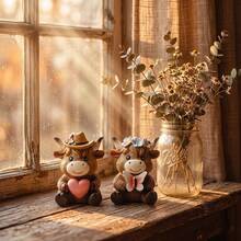 Four Little Oxen Figurines