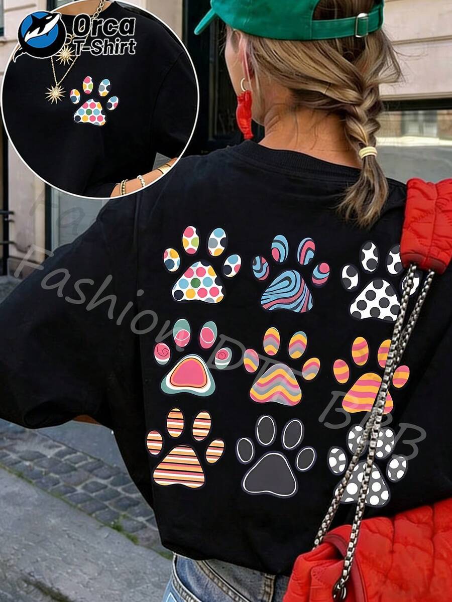 Estampado colorido de huellas de perro, estampado combinado de puntos y rayas, camiseta casual 100% para mujer con diseño de mascota, manga corta estilo Y2K, cuello redondo holgado casual de verano, lavable a máquina, top de primavera/verano. Camiseta unisex de algodón holgada de manga corta y cuello redondo estilo vintage urbano - Negro - Ver 1