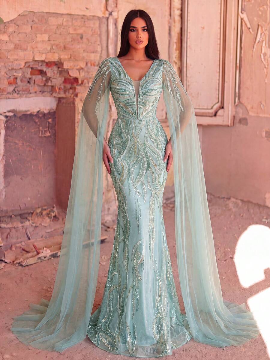 Đầm sequin cổ chữ V sâu với tay áo choàng và các chi tiết voan, thích hợp cho các buổi tiệc chiêu đãi, tiệc thời trang và các sự kiện long trọng. Kỳ nghỉ - màu xanh lá - Xem 1