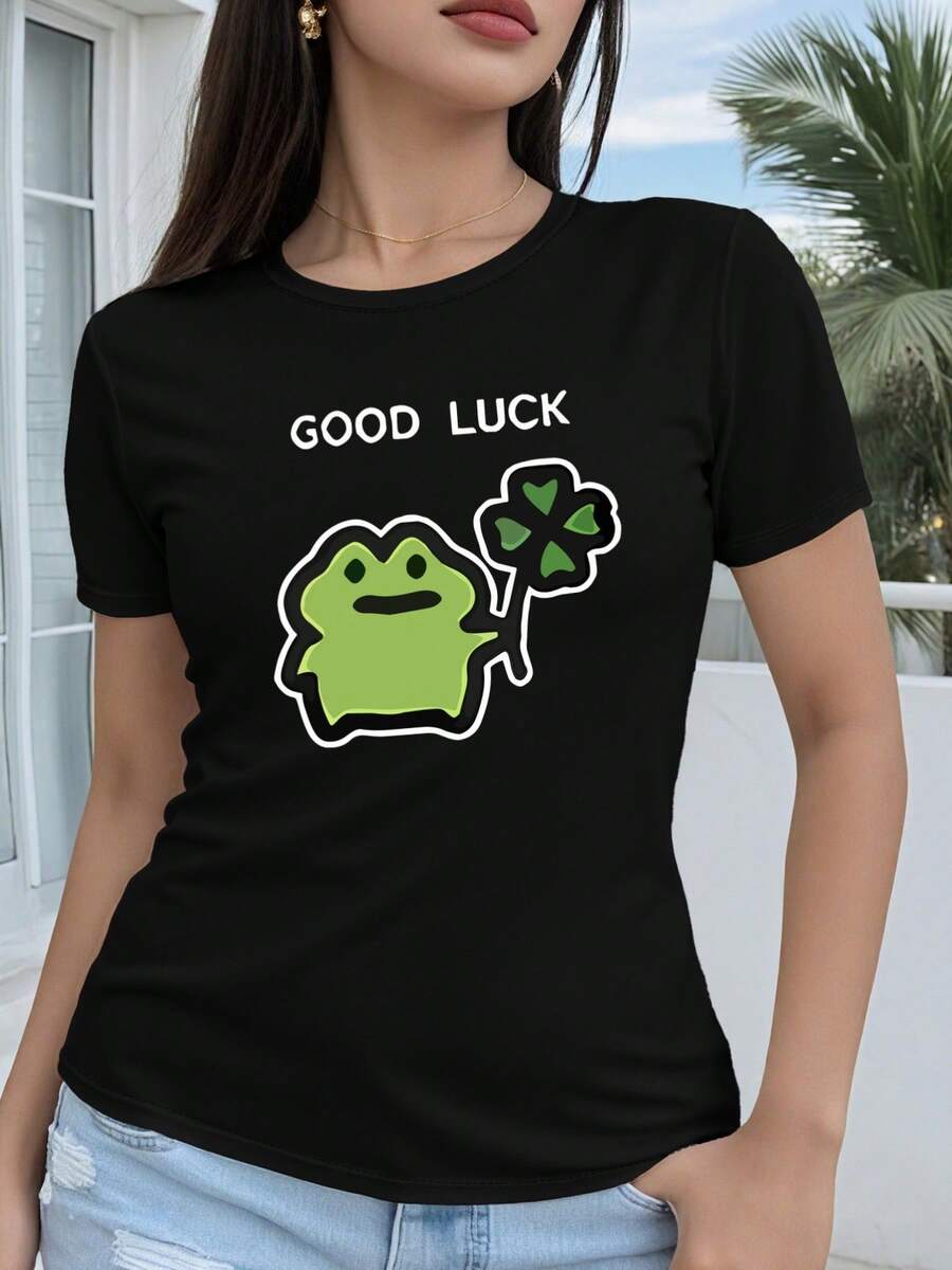 Manga Corta para Mujer Corte Regular - Dibujo Geométrico 2D Lindo Diseño de Rana con Trébol Estampado Camiseta Casual de Manga Corta con Cuello Redondo Versátil para Todas las Estaciones Múltiples Colores y Tamaños Disponibles Moda Festiva Estética Retro Material Transpirable Estampado Divertido - Negro - Ver 1