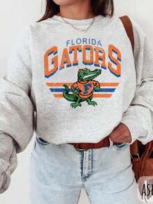 Florida Gator Sweatshirt Vintage Mascot Tee, Retro Graphic Florida Gator Football Shirt, Gators Graphic Unisex Softstyle T-Shirt (2) - Xám - Xem 1