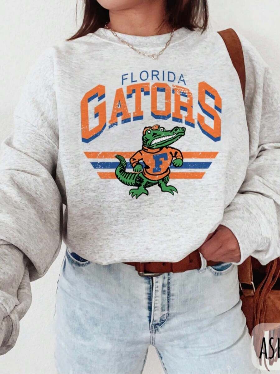 Florida Gator Sweatshirt Vintage Mascot Tee, Retro Graphic Florida Gator Football Shirt, Gators Graphic Unisex Softstyle T-Shirt (2) - Xám - Xem 1