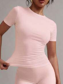 Camiseta básica de manga corta, cuello redondo, unicolor, ajustada y casual para mujer, verano, modelo 2025 - Rosa Pálido - Ver 1