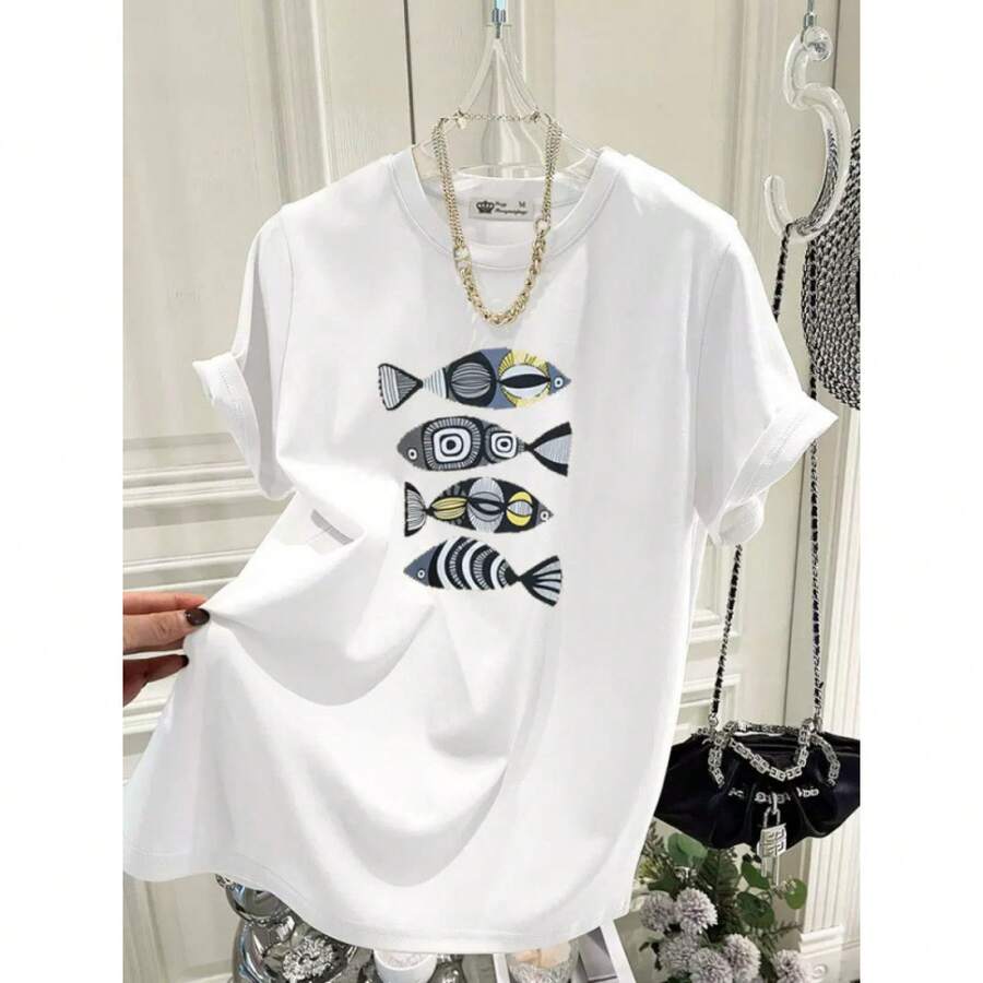 Camiseta de algodón puro para mujer, estilo holgado, de manga corta, con estampado de peces, a la moda, de longitud media, nueva colección de verano 2024. - Blanco - Ver 1