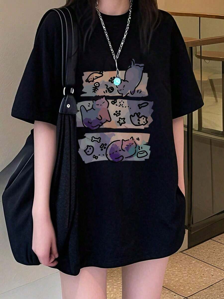 Playera negra para mujer cuello redondo corte holgado estilo japonés, manga corta con lindo estampado de gato caricatura, muy cómoda y versátil para primavera y verano, look juvenil super trendy ideal para uso diario y salidas relajadas. WATQ - Negro - Ver 1