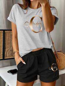 Conjunto de 2 piezas - Conjunto de pantalones cortos deportivos elásticos con estampado informal de verano para mujer, cuello redondo, manga corta, color negro - gris negro - Ver 5