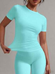 Camiseta básica de manga corta, cuello redondo, unicolor, ajustada y casual para mujer, verano, modelo 2025 - verde menta - Ver 6