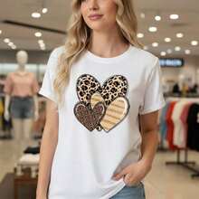 1 pieza de camiseta de algodón para mujer con estampado de corazón de leopardo, manga corta, cuello redondo, estilo casual, corte holgado, con estampado animal y gráfico de corazón a rayas, tallas S-5XL, camiseta básica negra para uso diario, blusa de moda de verano, 180g 100% algodón. - Blanco - Ver 8