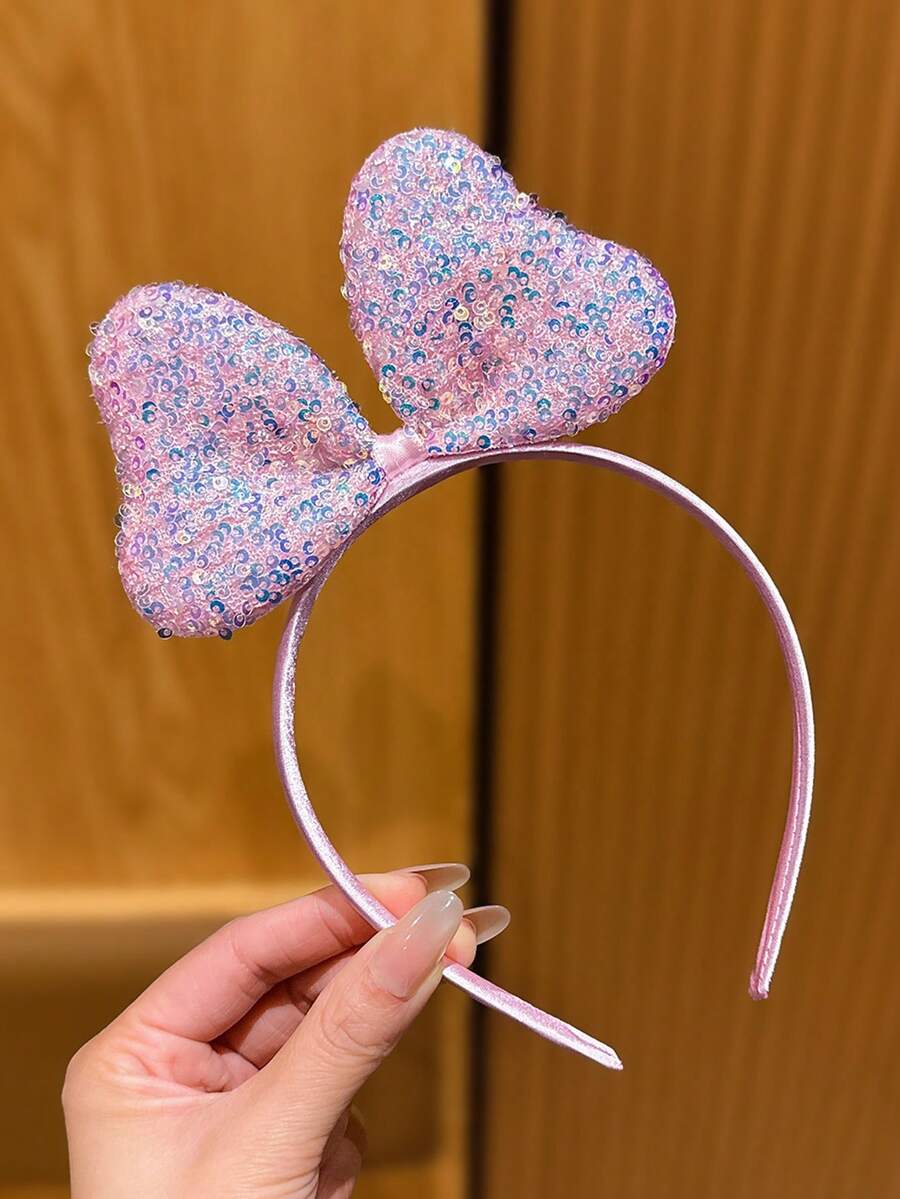 1个粉色3D蝴蝶结发箍，简约可爱发饰