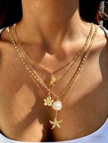 4件套优雅女士项链套装，复古别致设计，饰以仿珍珠、闪亮贝壳和海星吊坠，简约风格，适合节日、派对和日常佩戴。 - 金黃色4 - 查看 2
