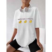 Camiseta de manga corta de algodón 100% con estampado divertido de un lindo patito amarillo de dibujos animados, estilo europeo y americano, elegante y versátil para el verano. - Negro - Ver 2