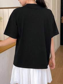 Camiseta de verano para mujer, holgada, informal, con estampado de lazo, cuello redondo y hombros caídos - Estilo vintage urbano, unisex, de algodón, manga corta, cuello redondo, ropa deportiva estilo Y2K, cuello redondo, 100% algodón, tejido suave, manga corta. 1 camiseta - Negro - Ver 3