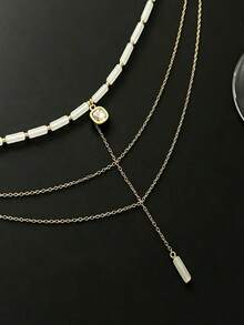 Dây chuyền mảnh đa năng, thời trang và độc đáo. Mặt dây chuyền hình trái tim đính hạt hình học đơn giản, thích hợp để đeo nhiều lớp. - Nhiều màu - Xem 5