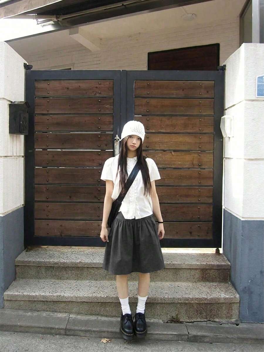 黑色复古褶皱泡泡及膝休闲女裙