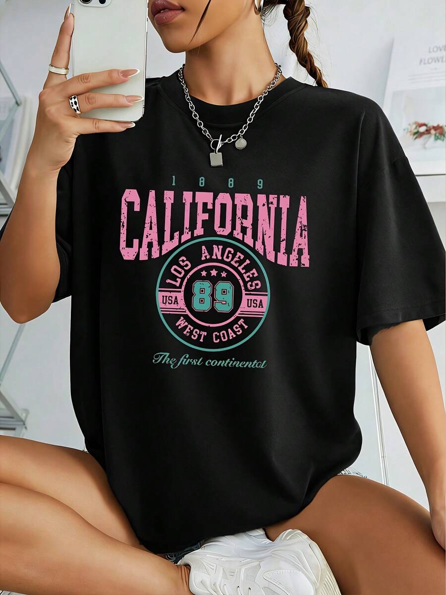 Primavera/Verano 2026, Nuevo Estilo, Camiseta de Mujer con Cuello Redondo, Estilo Simple y Moderno, Estampado de Letras, Manga Corta, Casual, Cómoda, Adelgazante, Estilo Vintage Urbano, Unisex, Holgada, de Algodón, Manga Corta, Cuello Redondo. - Negro 2 - Ver 1