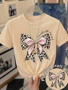 Nueva camiseta de manga corta con cuello redondo para mujeres, diseño primavera-verano, combina perfectamente un nudo de mariposa moderno y minimalista con estampados de letras en inglés, transpirable y absorbe la sudoración. Envío directo desde nuestro almacén local, modelo para parejas, ideal para llevar en pareja.-Vintage Street Style Unisexoose Cotton Short Sleeve Crew Neck T-Shirt - Albaricoque - Ver 7