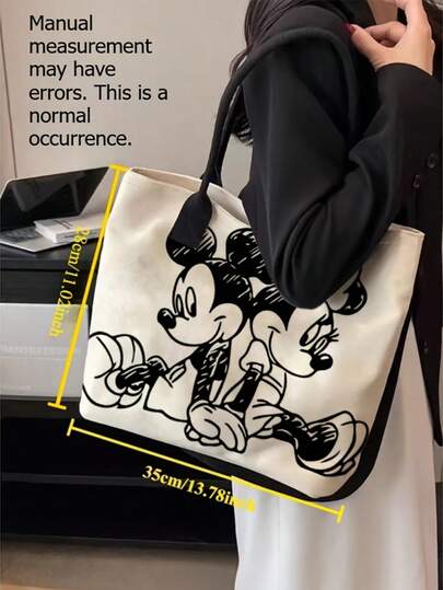  Giỏ đựng đồ Disney Mickey và Minnie, nhẹ, được thiết kế với quai đeo vai để mang thoải mái mà không gây khó chịu cho vai, hoàn hảo cho cả việc đi làm và mua sắm, cũng là một lựa chọn quà tặng tuyệt vời.