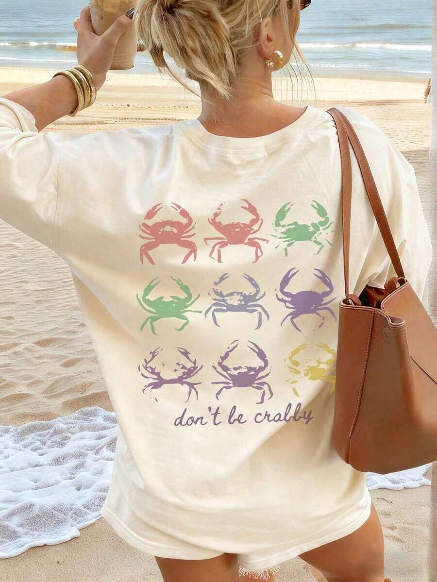Camiseta de manga corta azul claro para mujer, estilo casual de verano, con estampado de letras, animales marinos, tortugas, conchas y flores, corte holgado, cuello redondo, a la moda para uso diario y vacaciones, color blanco. - Albaricoque - Ver 1