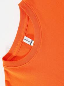 Camiseta de manga corta para niñas con estampado de la Virgen María de Guadalupe, una prenda versátil para el uso diario, una camiseta básica cómoda de algodón con cuello redondo, lavable a - Naranja - Ver 4