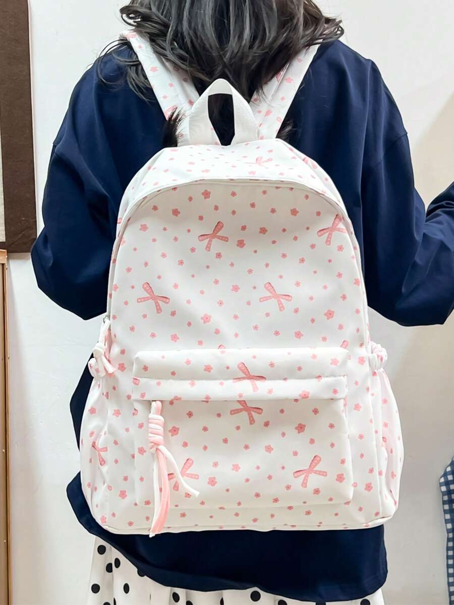 女士时尚全印花双肩包，方便出行携带物品，可调节肩带，适合学生返校、休闲旅行