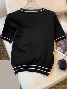 Nueva blusa de estilo casual de punto con cuello redondo y mangas cortas, con bloques de color, holgada y acortada, ideal para la primavera en color negro - Negro - Ver 2