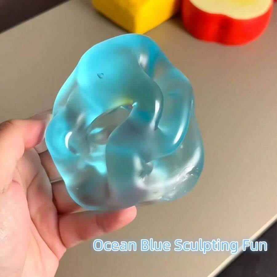 2个/1个可爱蓝色椰子油慢回弹挤压球，用于缓解压力和焦虑。椰子油慢回弹挤压球，透明蓝色减压球，麦芽质地挤压球，回弹不塌陷，柔软有嚼劲，麦芽质地，透明果冻触感，适合办公室放松/居家娱乐。柔软凝胶材质，无异味，椰子油质地，价格实惠，趣味十足，是母亲节/毕业礼物、情人节、婚礼、包包装饰、生日、房间装饰的理想之选。学生派对减压神器