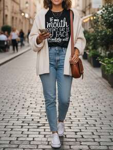 Limited Edition Women's T-Shirt, Lightweight And Breathable, Made Of Cotton. If My Lips Don't Say It, My Face Surely Will. A Modern And Versatile Crew Neck Top With A Letter Print. Lightweight Cotton. - 黑色 - 查看 1