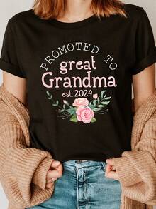 Camiseta con estampado de letras de moda y flores rosas "Promovida a bisabuela", manga corta y cuello redondo, top casual para verano y primavera, ropa de mujer - Negro - Ver 1