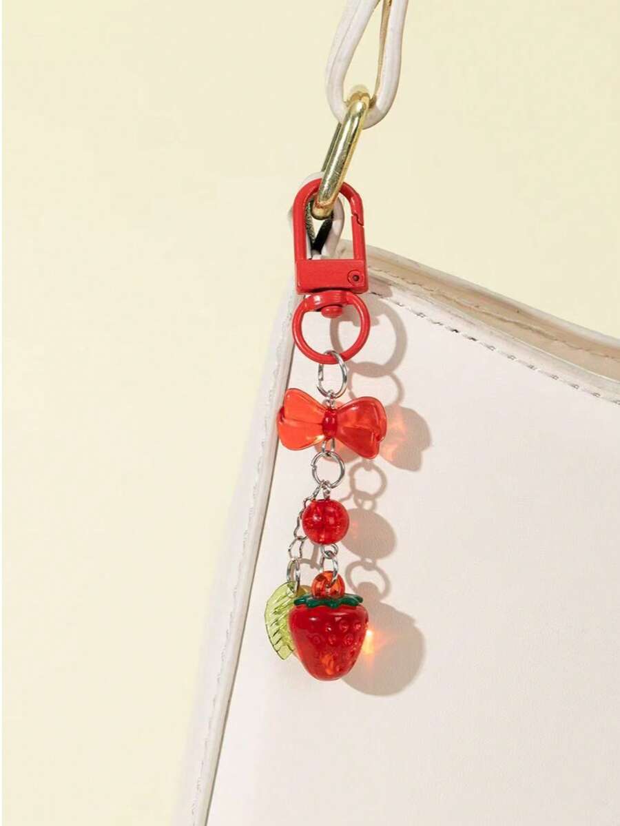 Lindo llavero con colgante de cuentas en forma de moño, fresa y hoja, accesorio para teléfono, colgante para bolso - Rojo - Ver 1
