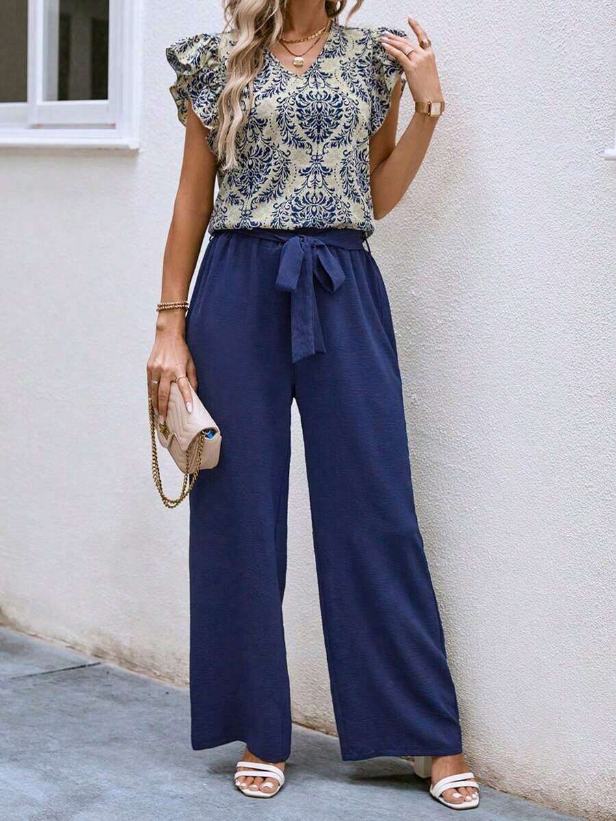 2 piezas Conjunto casual de vacaciones con blusa de mangas de casquillo con cuello en V con estampado floral y pantalones de pierna ancha para mujer - Azul marino - Ver 1