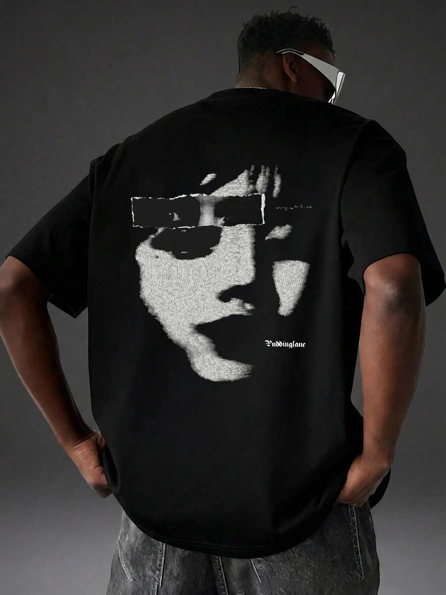 Camvyn Camiseta de manga corta casual y fashionable para hombre, con estampado, hombros caídos, suelta y transpirable, para verano - Negro - Ver 1