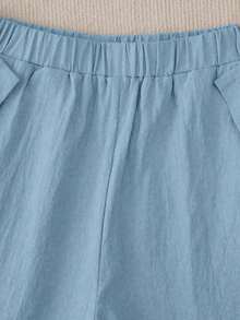 Pantalones casuales de mujer con bolsillo y decoración de botones de unicolor - Celeste - Ver 6
