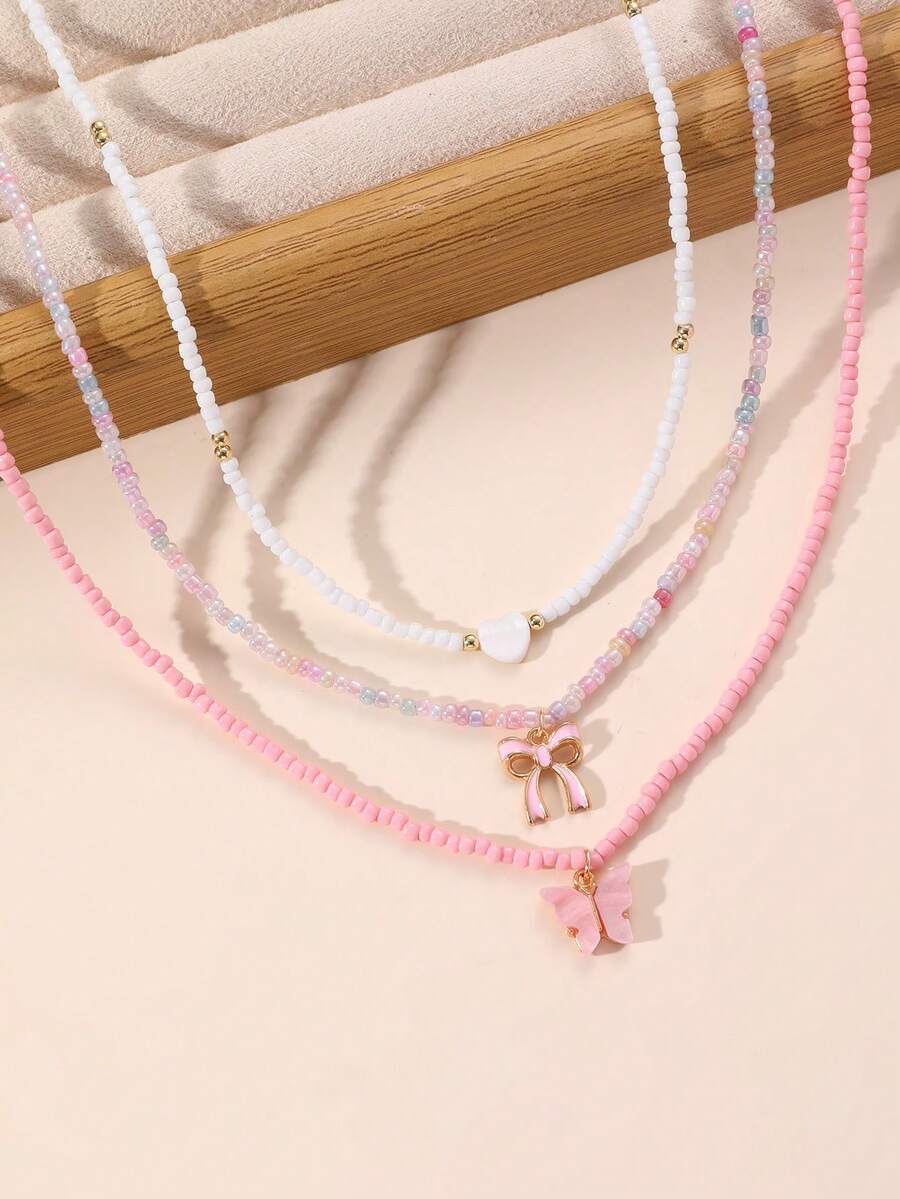Set de 3 collares para niñas con cuentas, mariposa y corazón - Multicolor - Ver 1