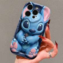 Disney Stitch Phone Case, Official Disney Lilo & Stitch Character Design, Cute Stitch Holding Chocolate On Dark Blue Background Protective Cover. Compatible With IPhone 17, 16, 15, 14, 13, 12, 11 Pro Series, Featuring Stitch With Large Eyes In A 3D Plush Style, Perfect For Disney Fans And Stitch Lovers To Showcase Their Favorite Character, Ideal For Birthdays, Holidays, Anniversaries, Graduation Gifts, Or Any Special Occasion To Surprise Family, Friends, Classmates, And Loved Ones. - trắng - Xem 4