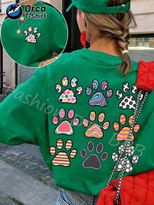 Estampado colorido de huellas de perro, estampado combinado de puntos y rayas, camiseta casual 100% para mujer con diseño de mascota, manga corta estilo Y2K, cuello redondo holgado casual de verano, lavable a máquina, top de primavera/verano. Camiseta unisex de algodón holgada de manga corta y cuello redondo estilo vintage urbano - Verde - Ver 1